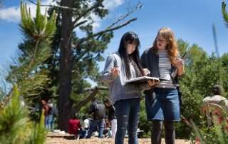 High school student with a teacher outdoors
